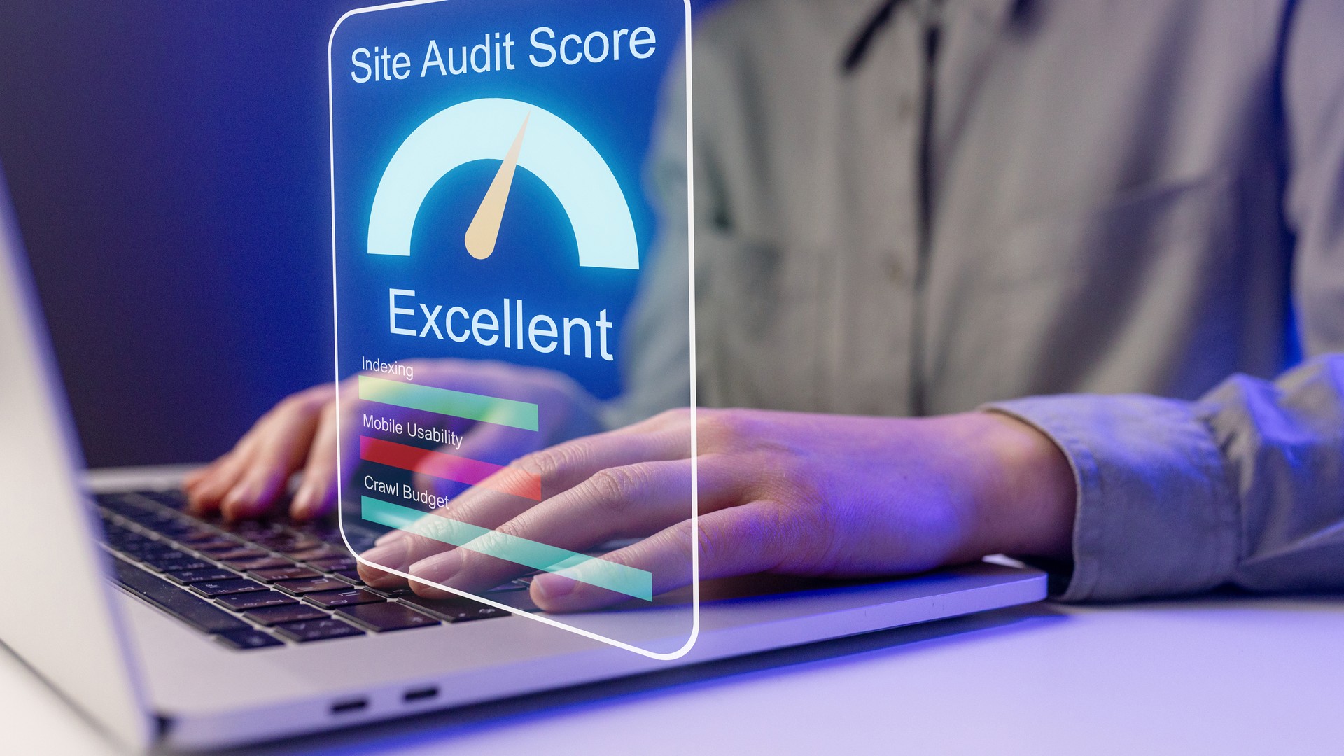 Small business owner checking a website audit score on a laptop at a workspace.