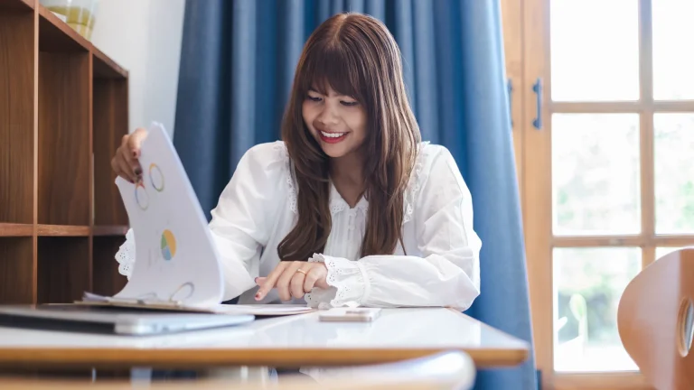 Business owner reviewing lead quality and performance charts